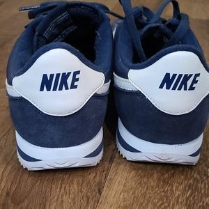 navy blue suede cortez